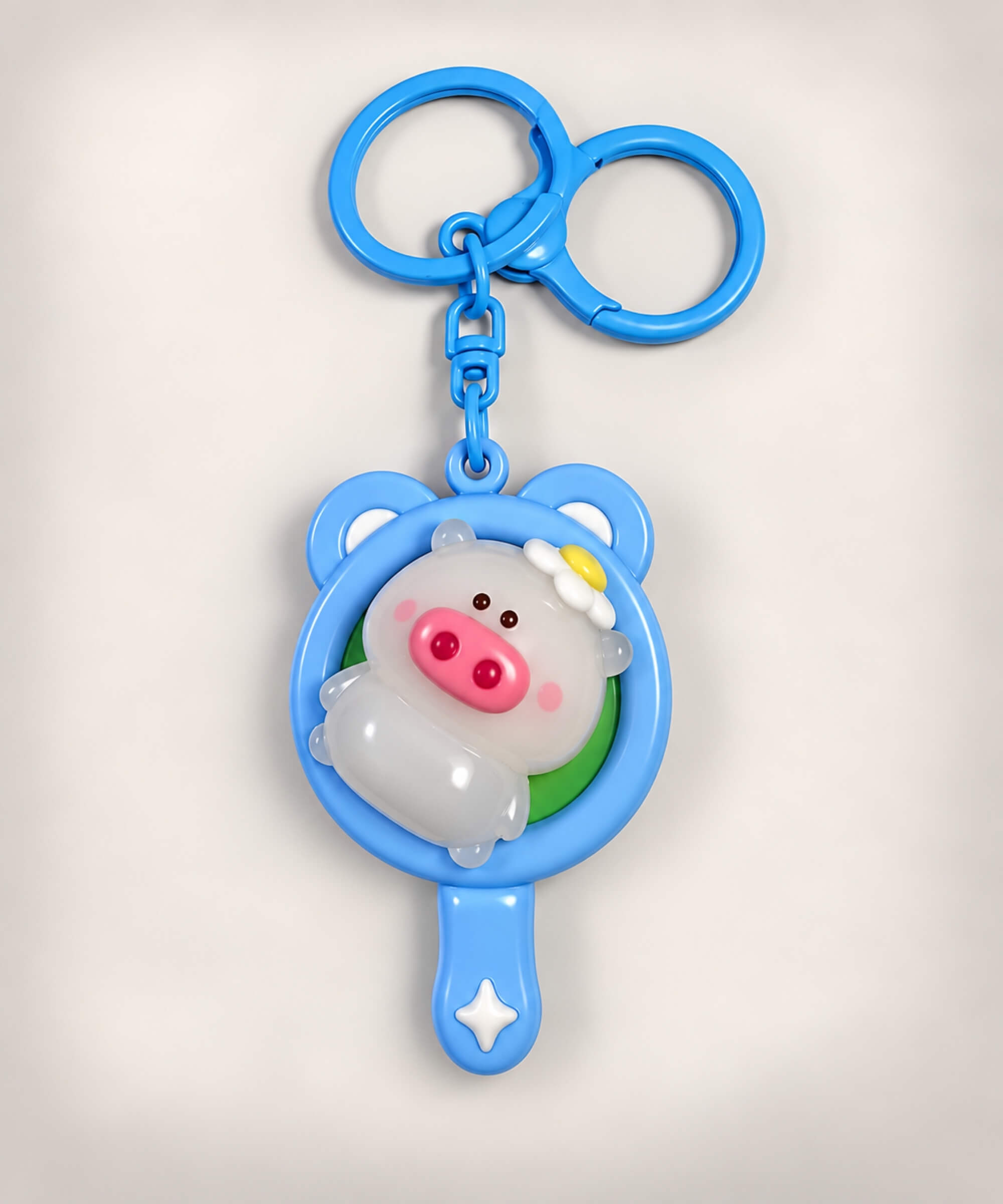 UV colour-changing Pig spinner keychain in pan-style frame